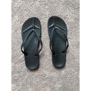 Black flip flops